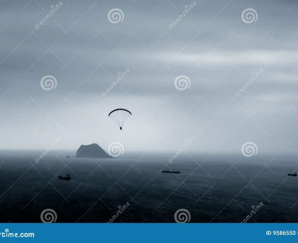 Parachuting tourists parasailing